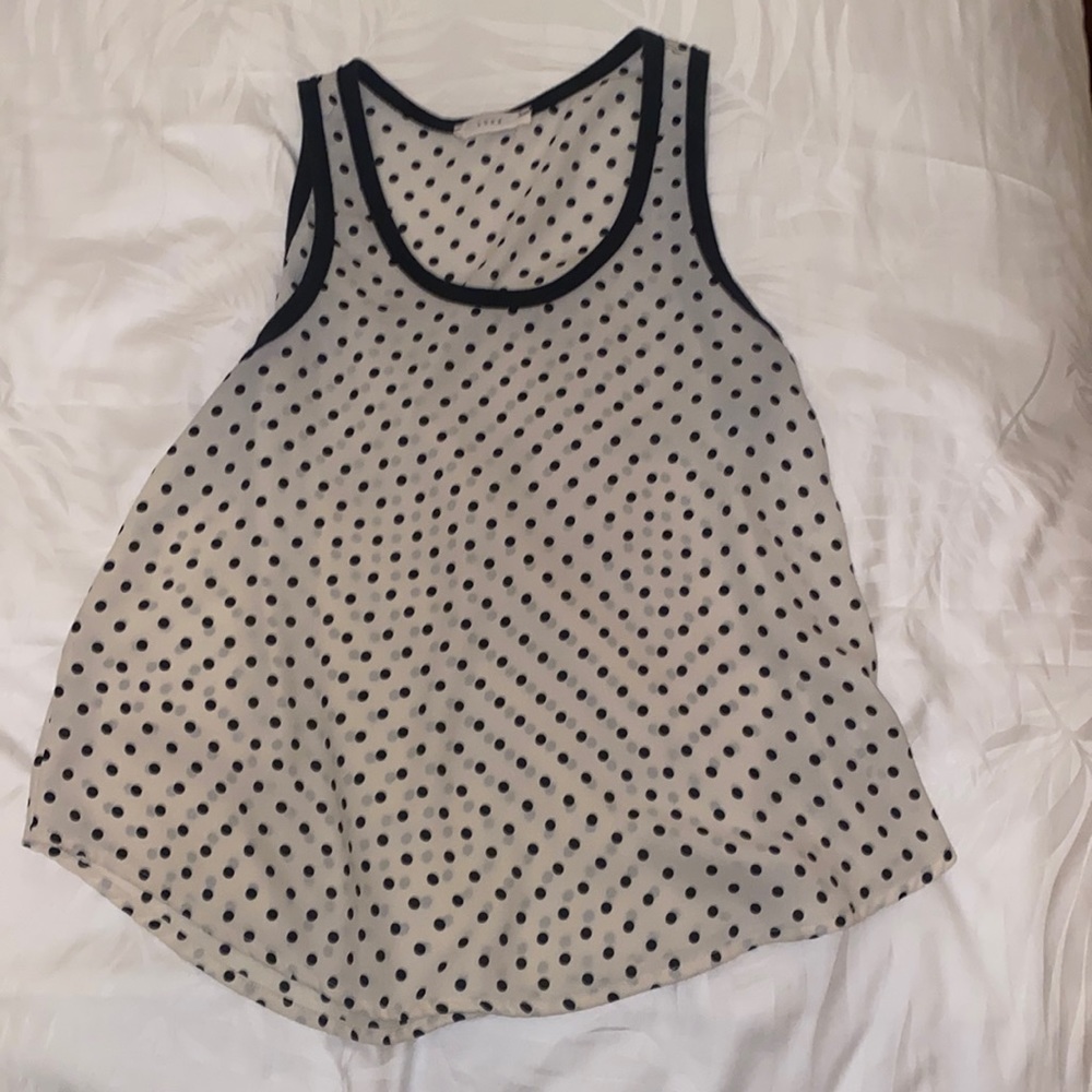 LUSH cream colored with black polka dot top